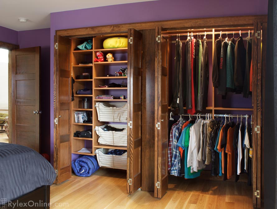 Dual Closets with Stack Shelving, Sliding Baskets and Hanging Rods
