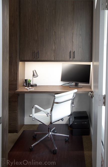 Small Desk Tucked in Master Closet