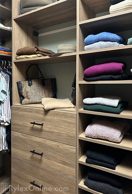Organized Closet with Open Shelves and Drawers