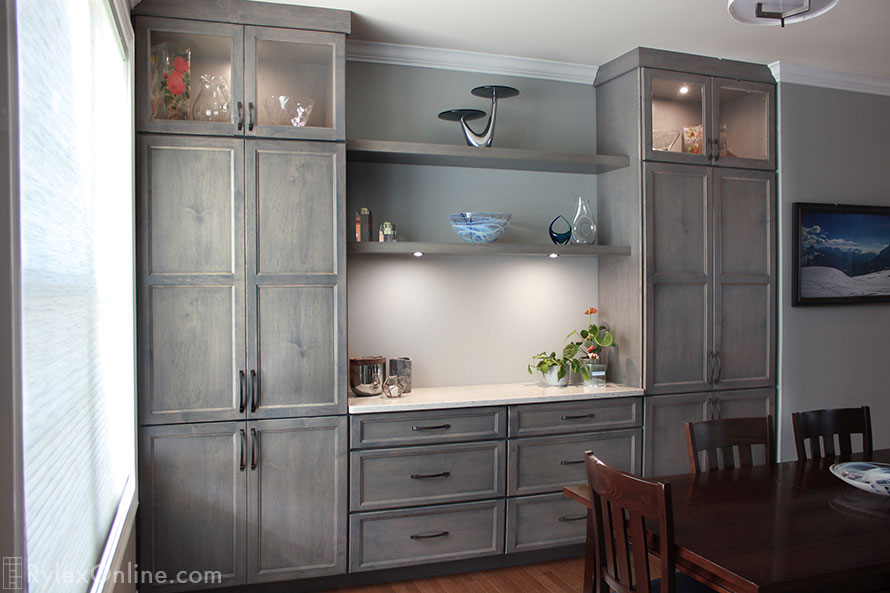Built-In Dining Room Cabinets with Floating Shelves and Glass Doors