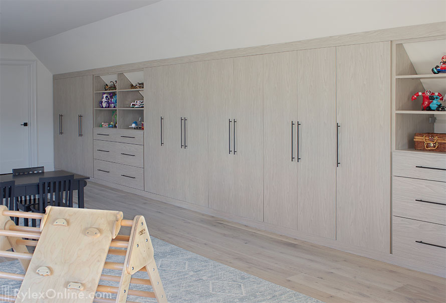 Extensive Built-In Playroom Storage Cabinets