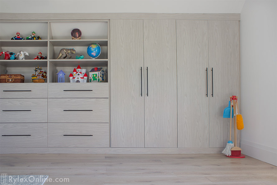 Organized Playroom Cabinets with Open Shelves and Storage Drawers