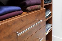 Floor to Ceiling Master Closet with Angled Walls