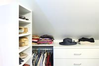 Maximize Storage with Sloped Ceiling Closet