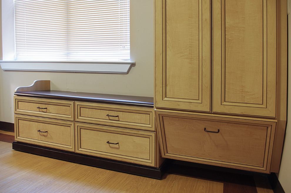 Assisted Living Cabinets with Soft Edges and Angled Shoe Drawer