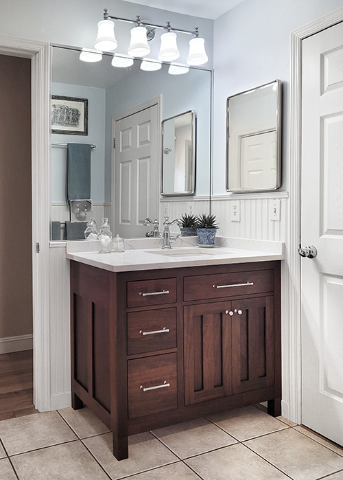 Craftsman Bath Vanity Cabinet with Three Drawers and a Wrap Around Plumbing Drawer
