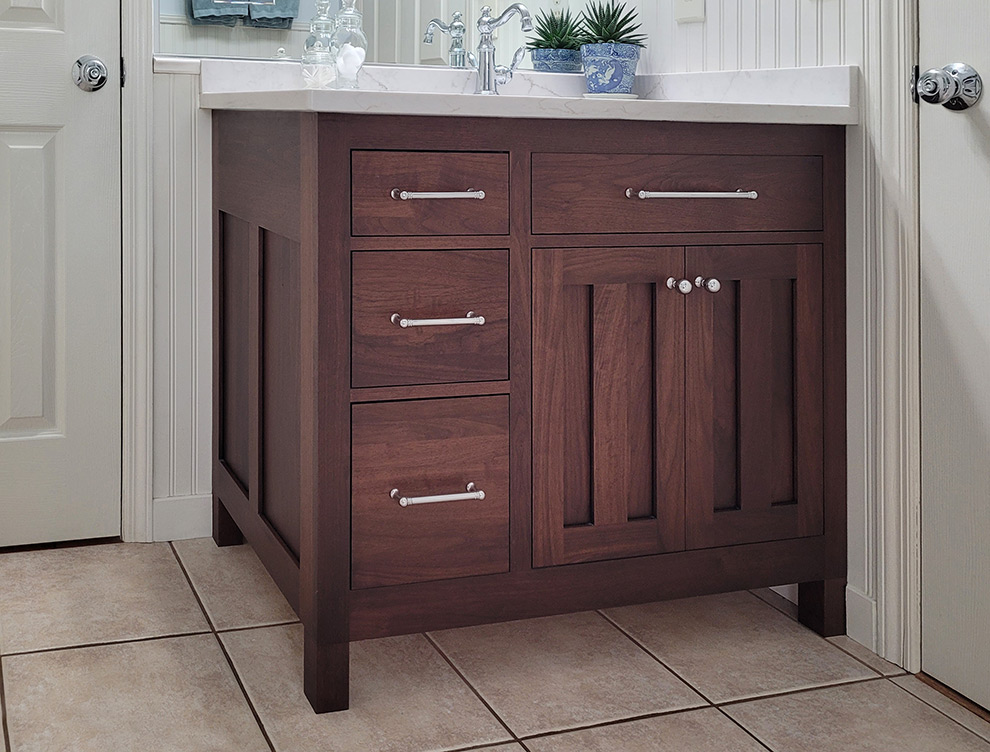 Walnut Craftsman Style Vanity with U-Shaped Drawer Wraps Around Plumbing