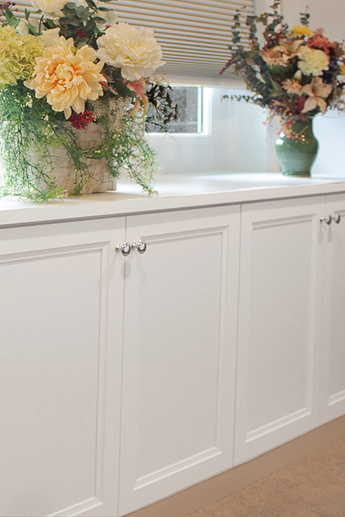 Close On Built-In Dresser White Cabinets