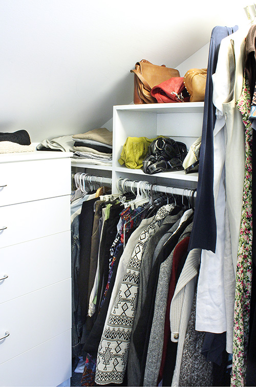 Sloped Ceiling Closet with Angled Shelves, Hanging Space and Closet Drawers