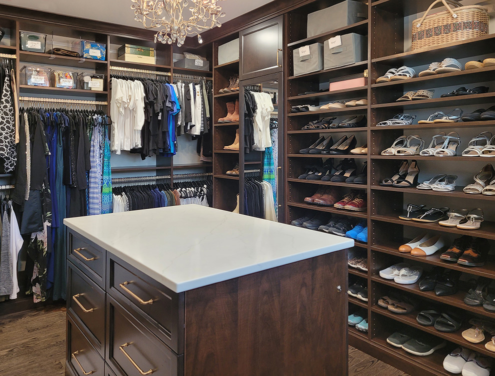 Primary Closet with Storage Island and Adjustable Shoe Shelves
