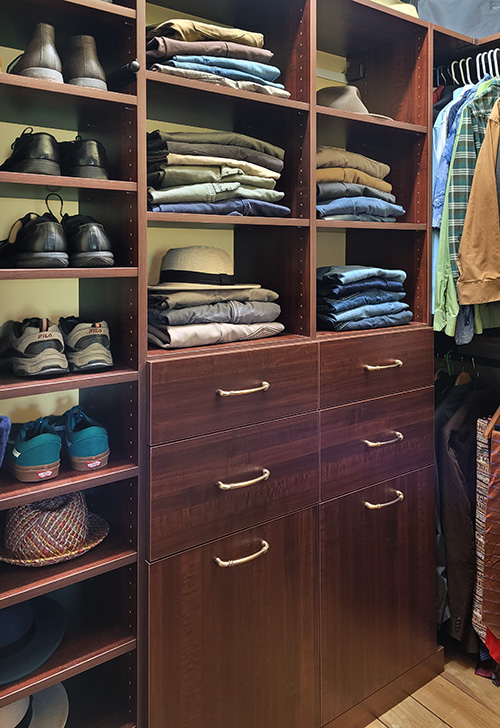Custom Primary Closet with Adjustable Shoe Shelves and Cabinet Drawers