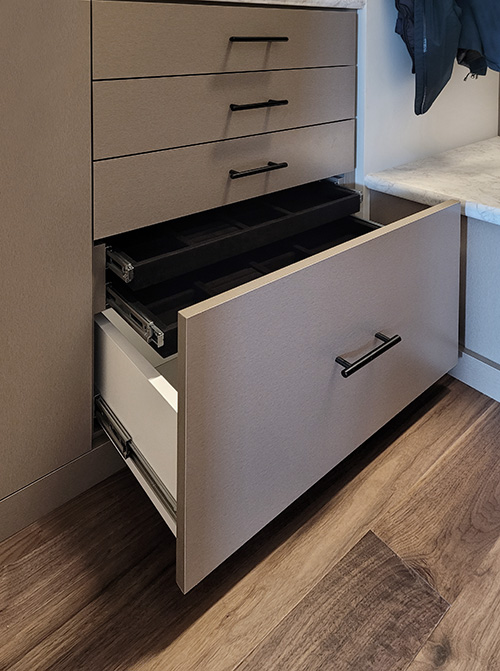 Drawer Cabinet with Double Tier Jewelry Drawer and Drawer Space Behind One Drawer Face