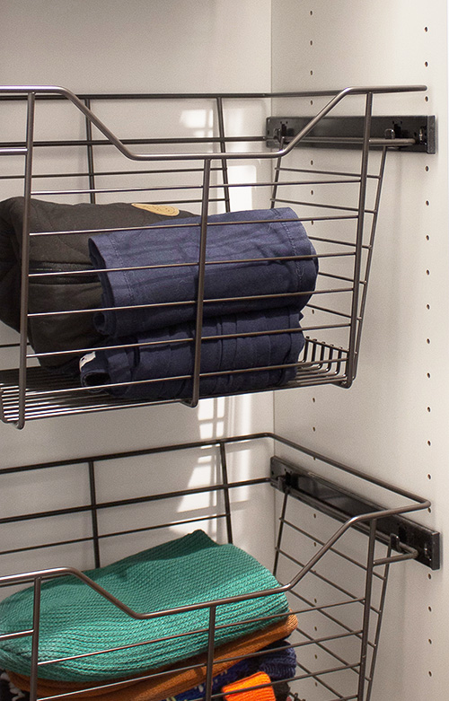 Close Up of Hall Closet with Sliding Baskets