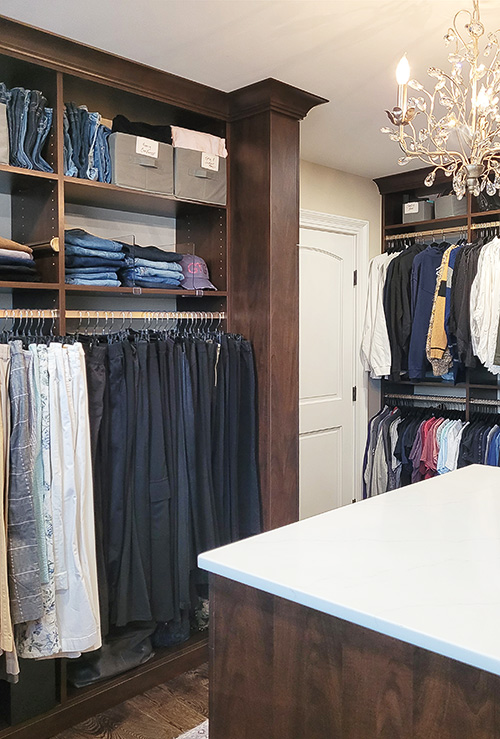 Primary Large Closet with Maximum Hanging Space and Sliding Valet Rod