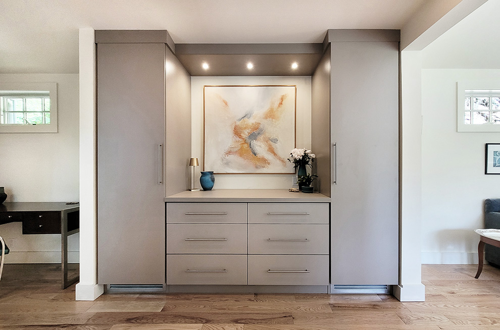 Custom Built-In Cabinetry Flanked by Two Wardrobes with Center Drawers in the Hudson Valley, NY