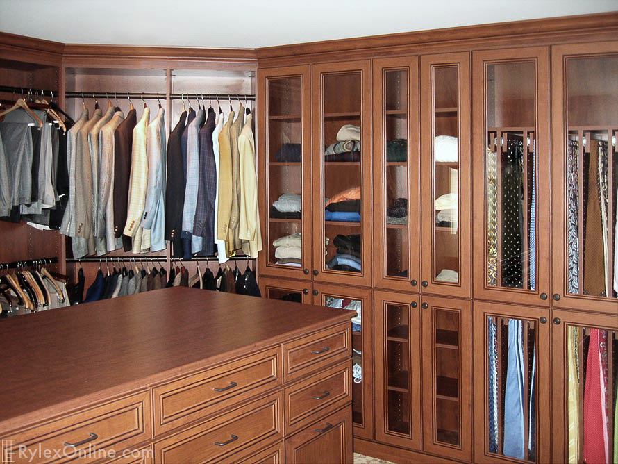 Master Walk In Bedroom Closet With Tv Tie Cabinet Orange