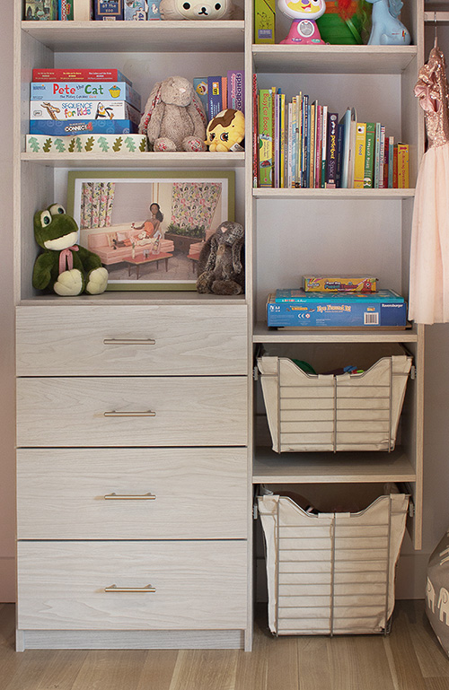 Kid's Closet with Cabinet Drawers and Sliding Baskets Close Up