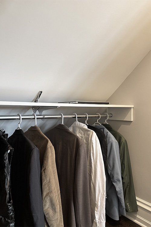 Angled Ceiling Bracket Turns Wasted Space to Closet Storage 