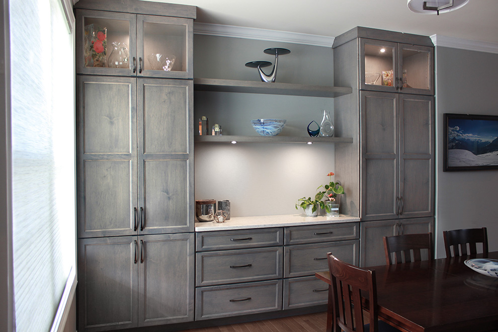 Built-In Dining Room Cabinets with Floating Shelves and Glass Doors