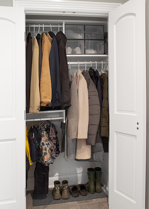 Coat Closet Effcient Storage and Rods Close Up