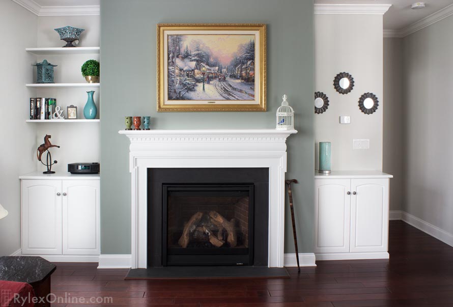 Alcove Cabinets Frame a Fireplace with Open Shelves for Collectibles
