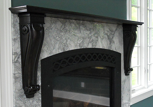 Custom Fireplace Mantel with Decorative Corbels Close Up