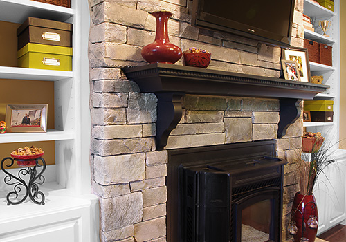 Cabinet with Bookcase and Custom Fireplace Mantel with Corbels Close Up