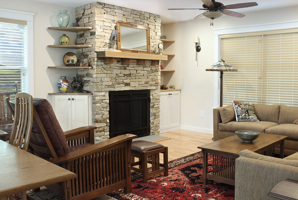 Fireplace Cabinets and Shelves Surround the Fireplace