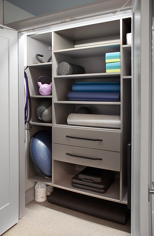 Home Gym Storage Closet with Open Shelves and Drawers