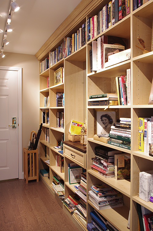 Library Shelves Wrap the Room From the Entryway