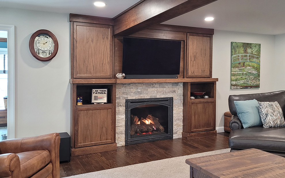 Built-in Fireplace Cabinets with Open Shelves and Additional Storage