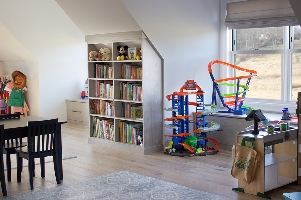 Kids Playroom Bookcase Tucked Under Eaves