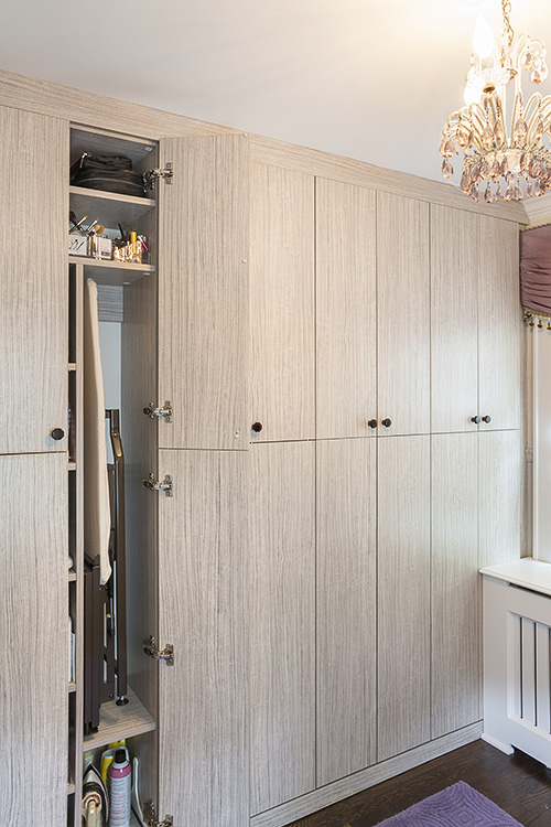 Ironing Board Folds into Cabinet