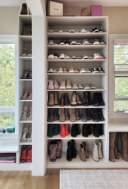 Primary Walk-In Closet for with Narrow Shoe Cabinet and Adjustable Shoe Shelves