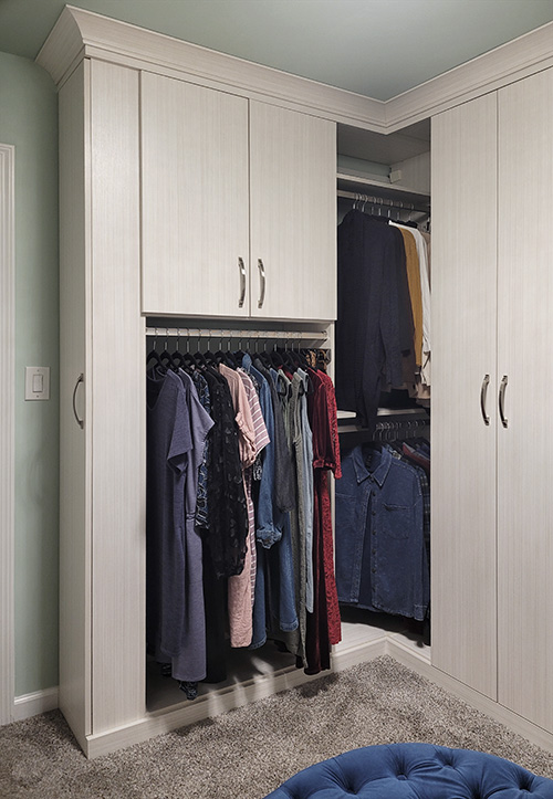 Primary Walk-In Closet Organization Hanging Storage & Cabinets