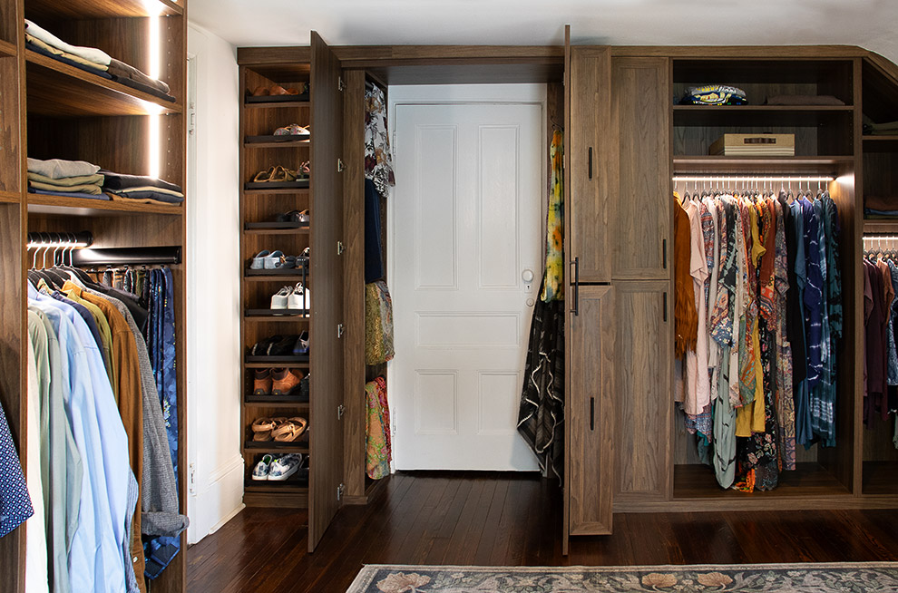Shared His and Hers Closet with Scarf Storage Behind Mirrored Doors and Cabinet Lighting - View More Options