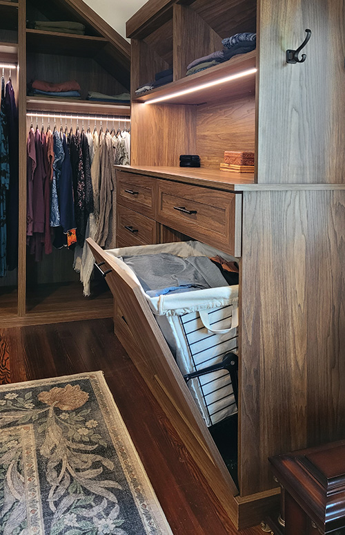Custom Primary Walk-In Closet with Bureau and Built-In Tilt-Out Hamper - View More Options