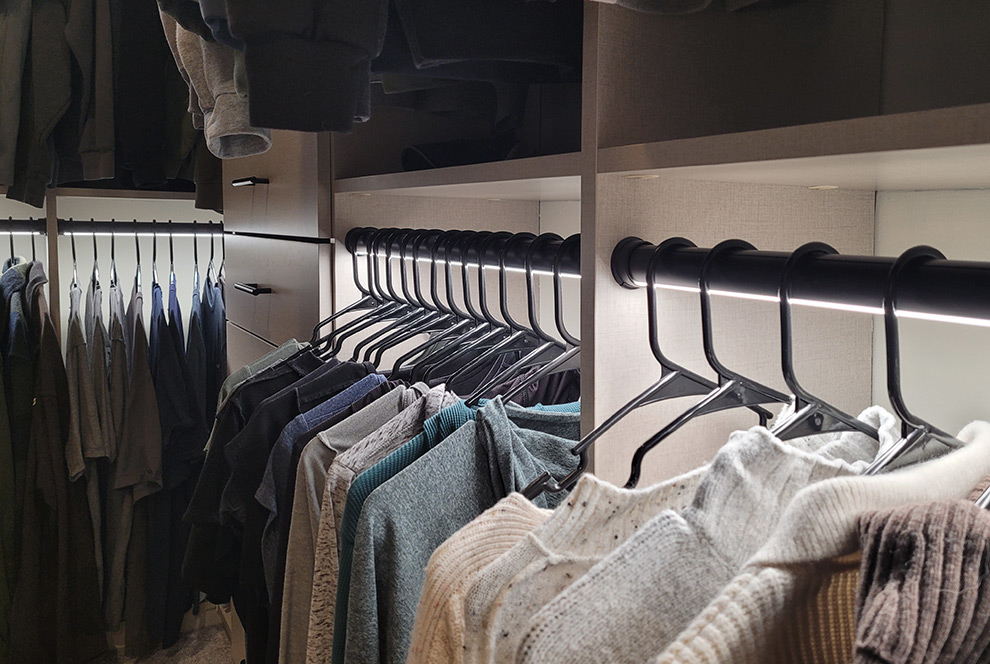 Primary Walk-In Closet with Multiple Lighted Garment Rods - View More Options