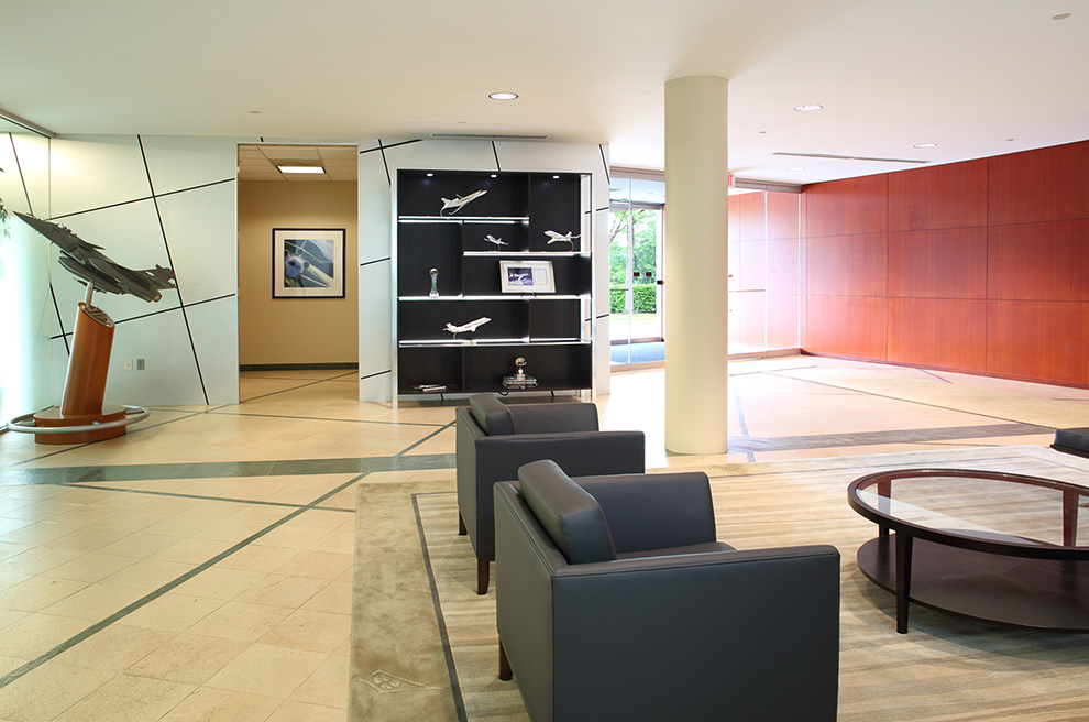 Dassault Falcon Jet Corp Reception Area Renovation with Sleek Display Cabinet