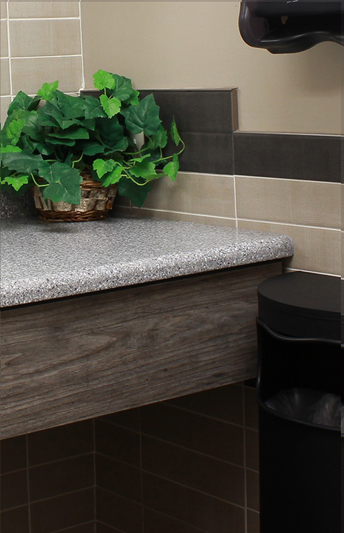 Fascia Adds Finishing Touch to Commercial Bathroom Close Up