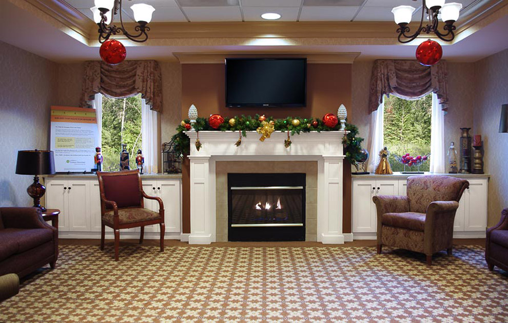 Community Room with Fireplace Surround Cabinets