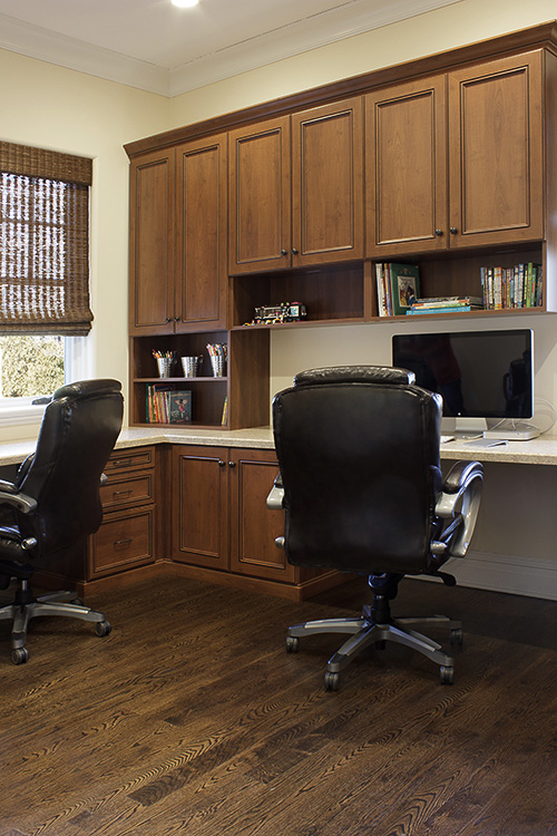 Home Office with Generous Supply Cabinets and Open Shelves