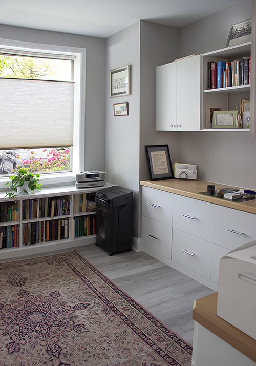 Office with Abundant Cabinet Drawers and Stand-alone Bookcase