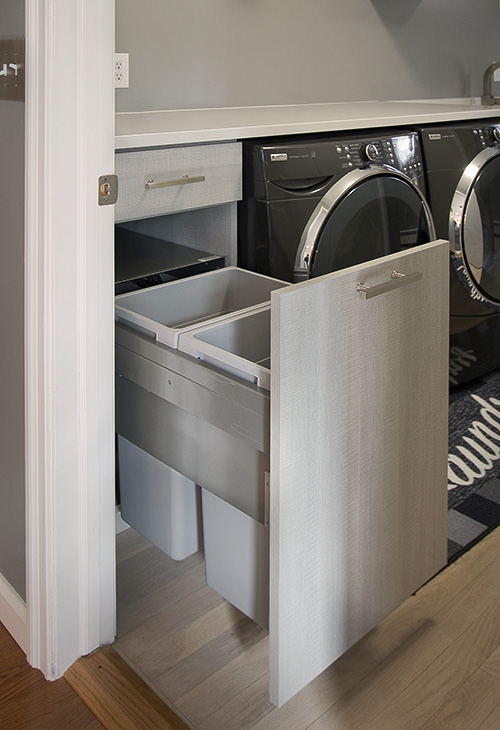 Laundry Room with Pull out Trash Bins