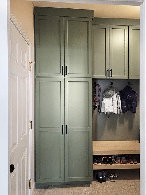 Floor to Ceiling Laundry Cabinets with Shoe Bench