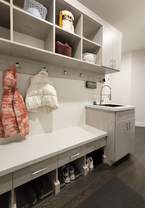 Galley Mudroom Design with Bench and Sink Cabinet