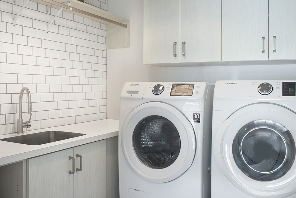 Functional Laundry Room Winter Fun with White Counters