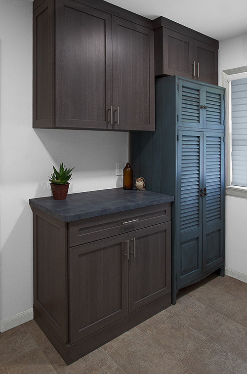 Vintage Cabinet Incorporated with New Laundry Cabinets