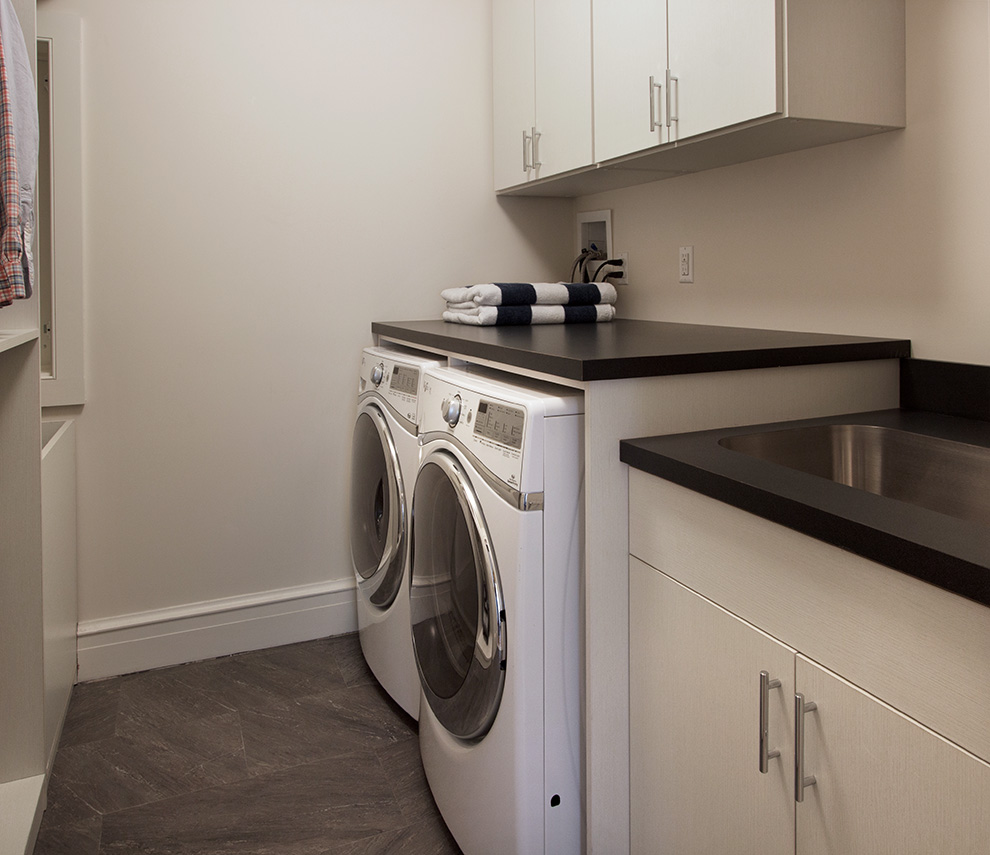 Laundry Island with Cabinets and Folding Counter