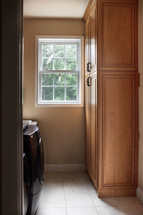 Laundry Room with Vacuum, Broom and Linen Cabinet